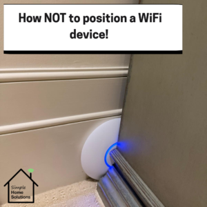 WiFi installation Barnes: A Ubiquiti WiFi device poorly positioned behind a cupboard in a 4-storey home.